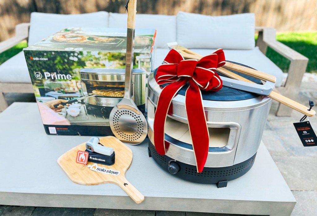 pizza oven stove with big red bow outside