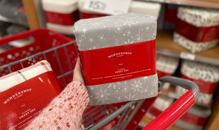 hand holding snowflake wondershop sheet sets
