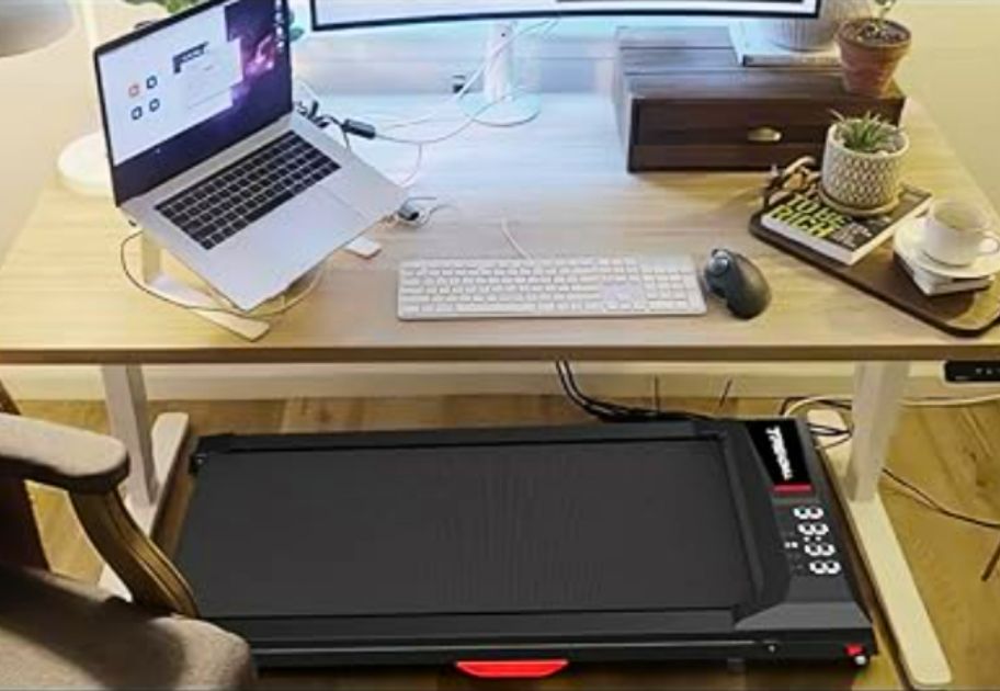 under desk treadmill being stored under a desk