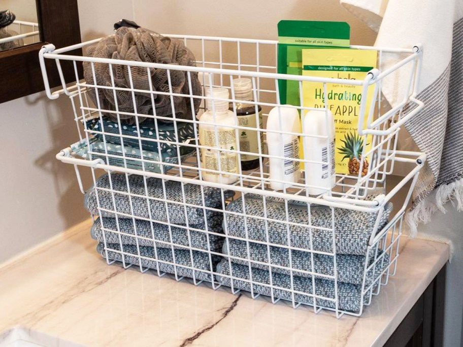 white stacking metal baskets