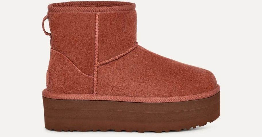A reddish-brown UGG shoe
