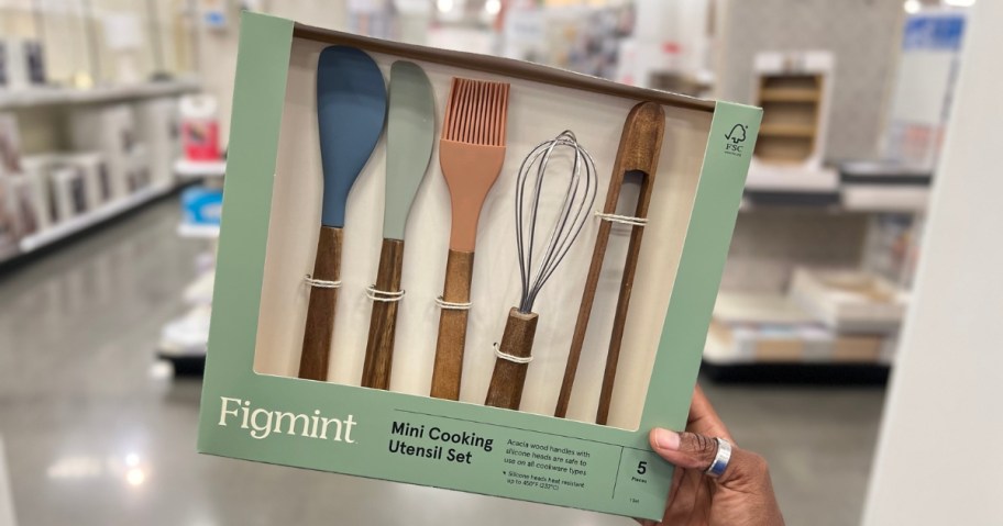 hand holding a box with a Figmint mini utensil set at Target