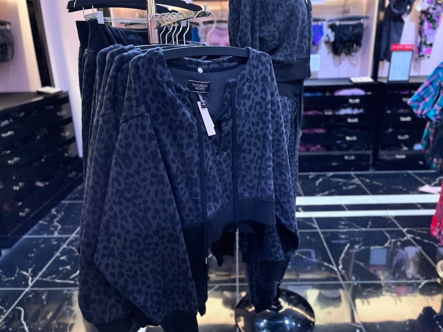 grey leopard print top on display in store