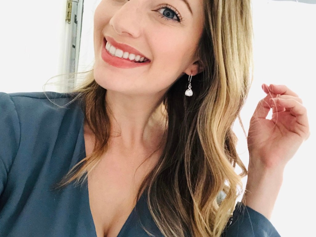 woman wearing cate and chloe drop earrings 