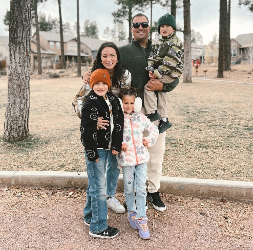 family standing together outside