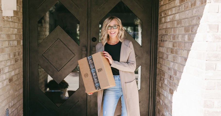 woman wearing long knit sweater coat coatigan holding amazon box