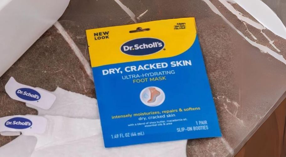 dr scholls foot mask pack with foot mask booties on bathroom floor