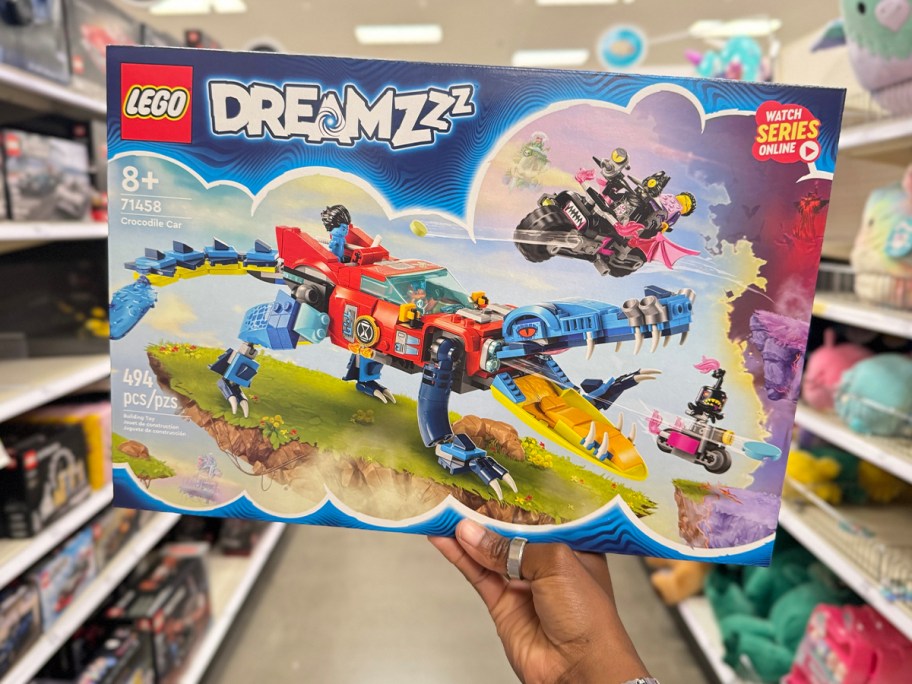 hand holding lego dreamzz set