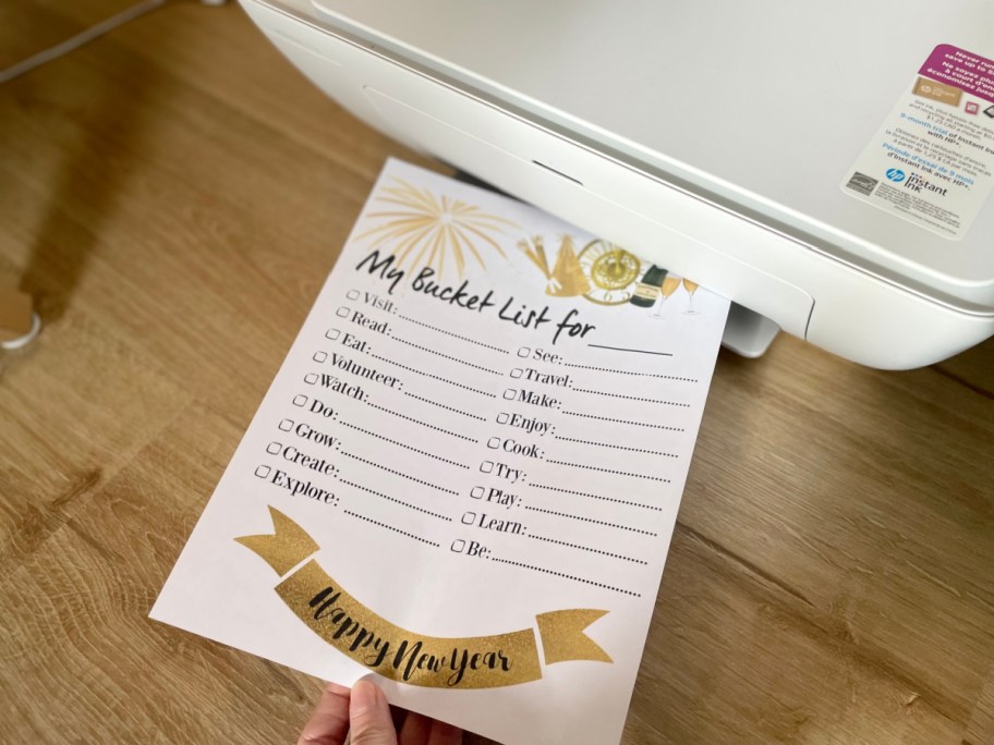 new years bucket list printable coming out of the printer