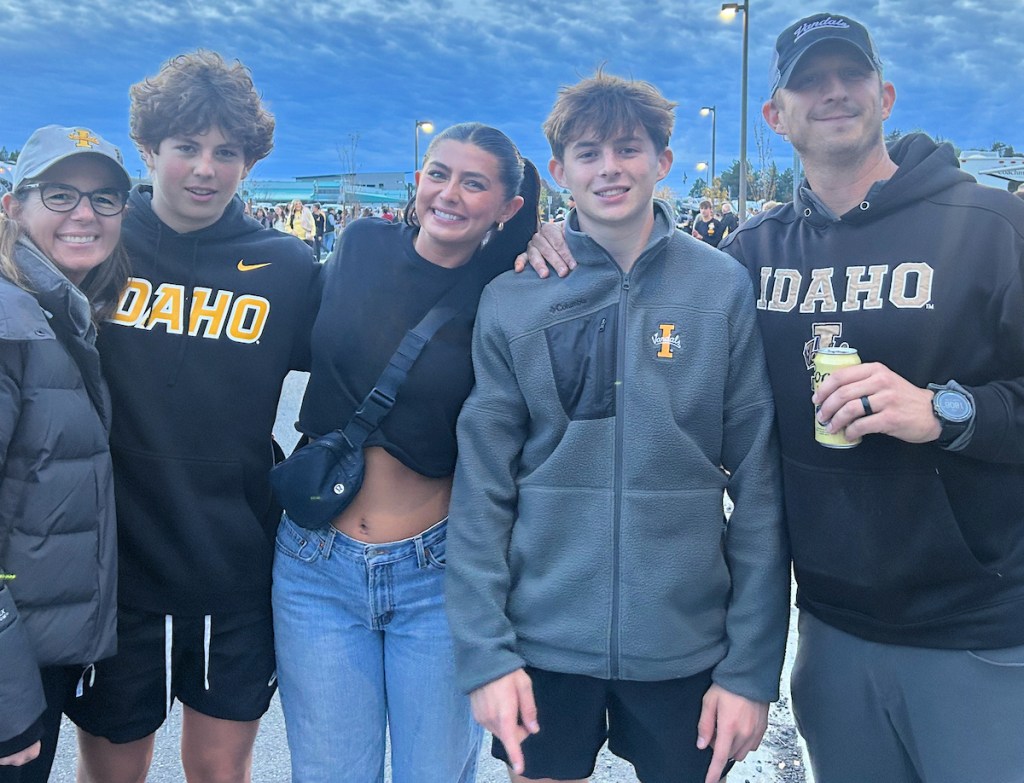family wearing idaho apparel standing outside