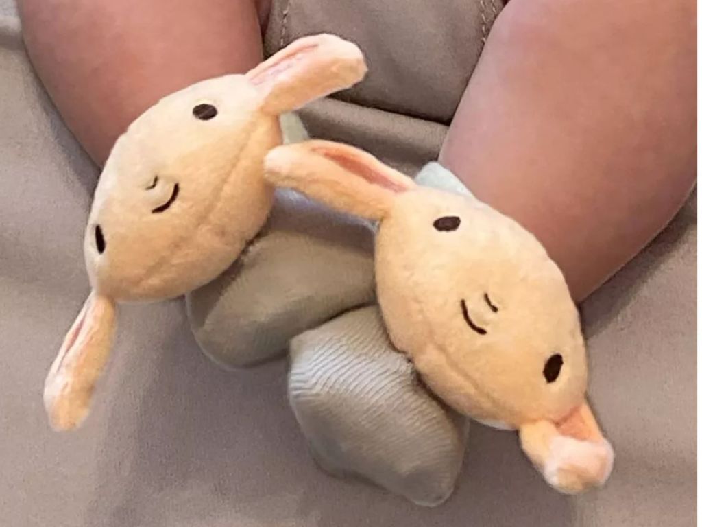 baby's feet wearing Harry Potter Dobby Rattle Socks