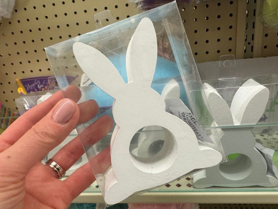 Hand Holding a Hobby Lobby White Bunny Napkin Rings