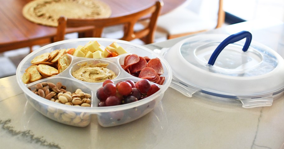 Lock N Lock Fruit & Veggie Tray full of charcuterie items on counter