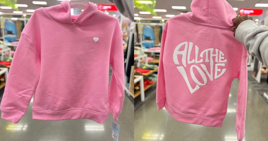 image showing front and back of a pink Valentine's kid's hoodie that has a heart on the front and the words "All the Love" on the back