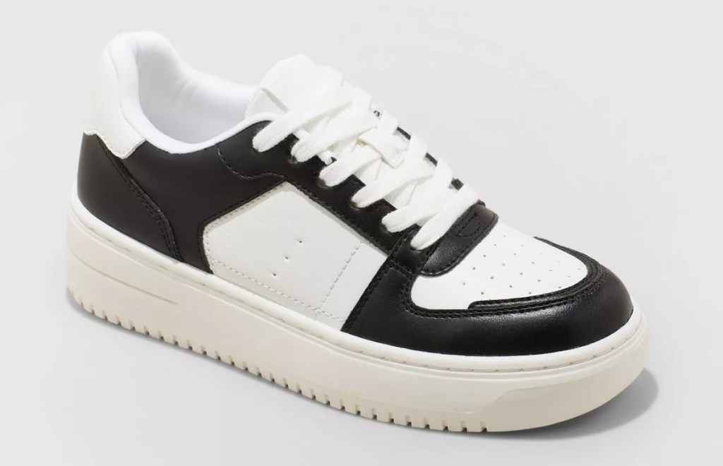 Stock photo of white and black platform sneaker