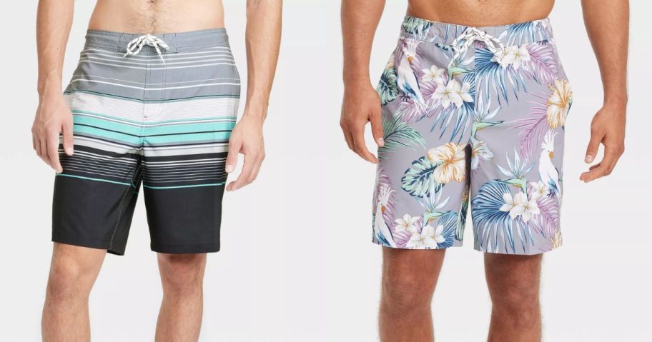 man wearing grey, teal, black stripe board shorts and man wearing grey, pink, blue Hawaiian floral print board shorts