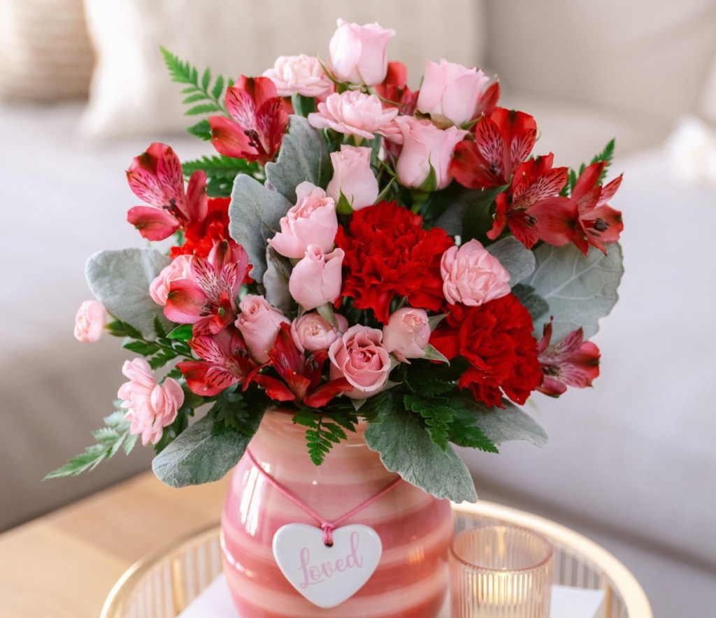 valentine's day flower arrangement in pink vase