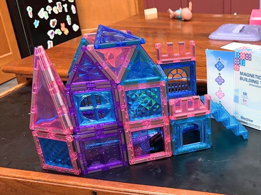 magnetic tiles built into a castle on table