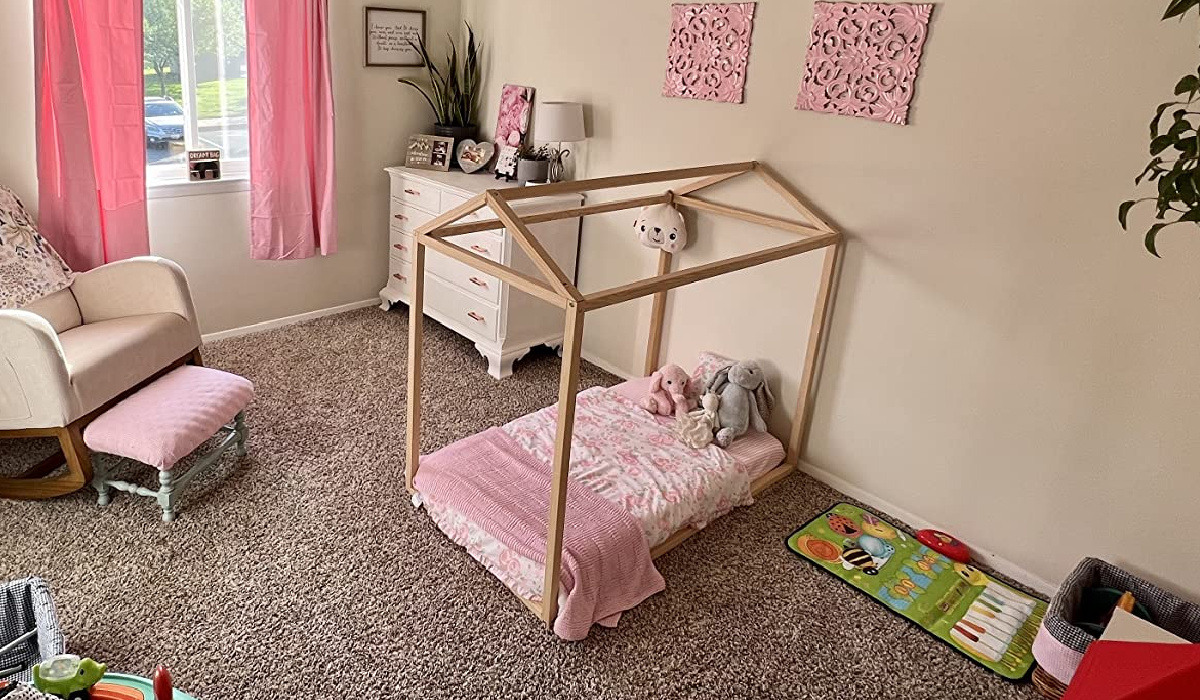 wooden house frame bed in kids room