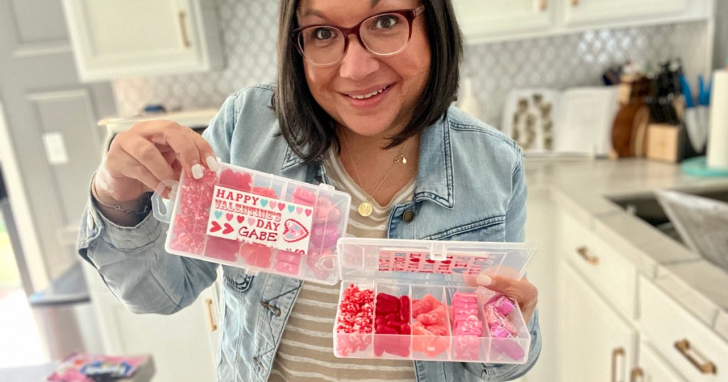 woman holding a valentine's day snackle box