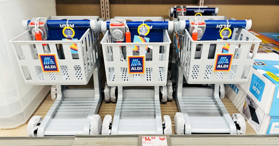 ALDI toy shopping carts in a row