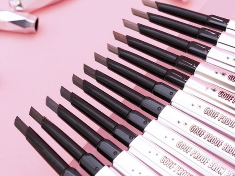 row of Benefit Cosmetics Brow Pencils open showing different colors 