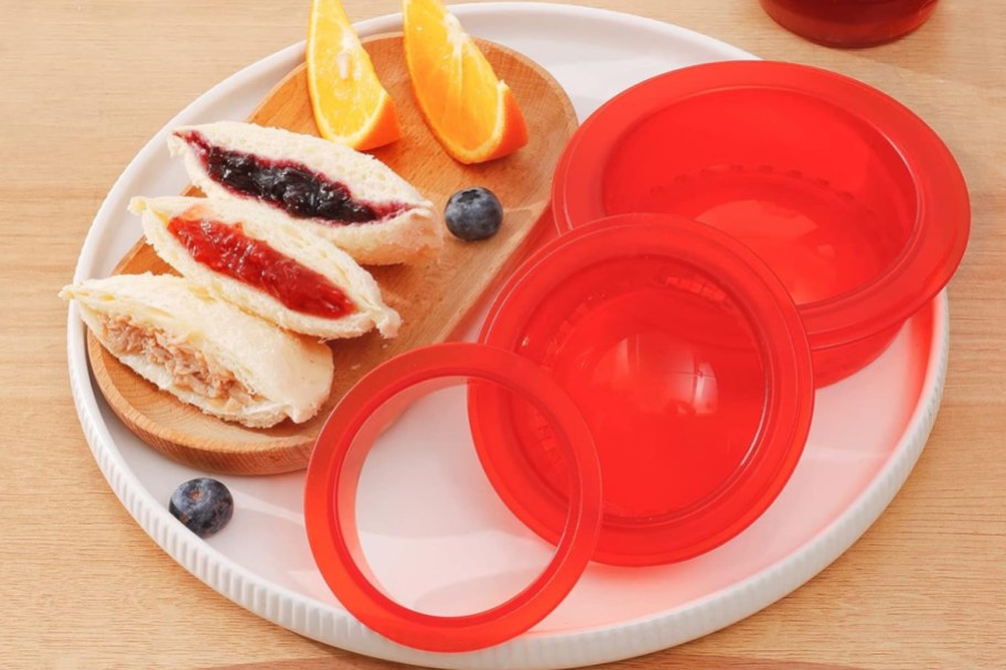 plate displayed with a sandwich with 5 piece crustless sandwich cutter