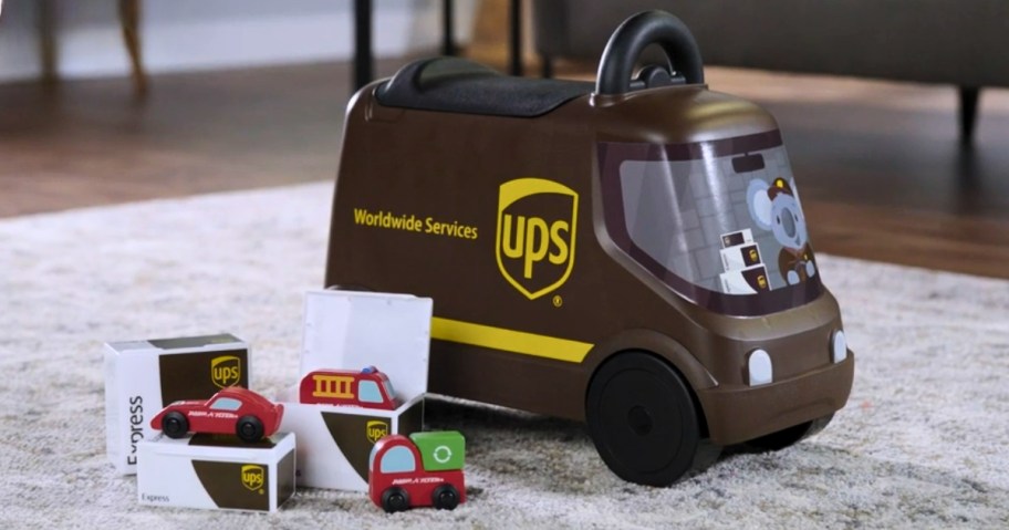 kid's ride-on IPS delivery truck with play packages in a living room