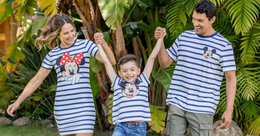 A mom dad and son all wearing matching disney clothing from PatPat