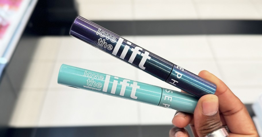 hand holding two tubes of Sephora Collection Love The Lift Curling + Volumizing Mascara