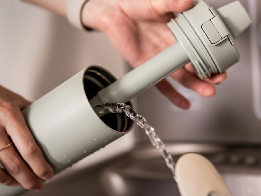 filling a water bottle from a water fountain