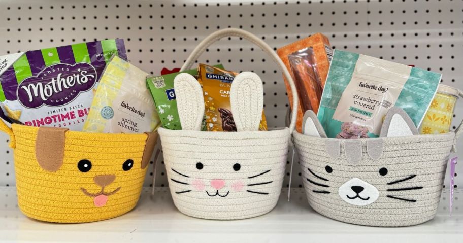 3 Spritz circular rope character easter baskets filled with easter treats on a shelf at Target.