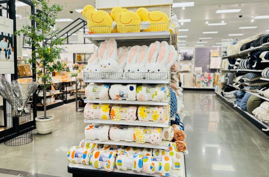 An endcap of Easter Throw Pillows and Blankets at Target