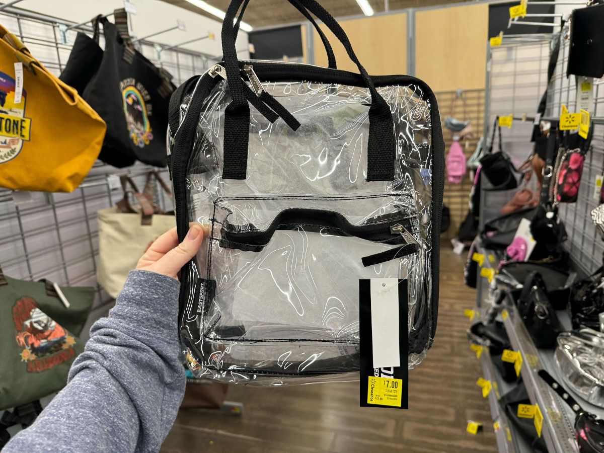 An Eastsport clear backpack in a store