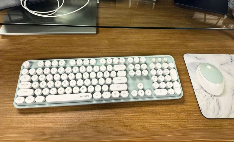 wireless keyboard and mouse bundle in white on desk