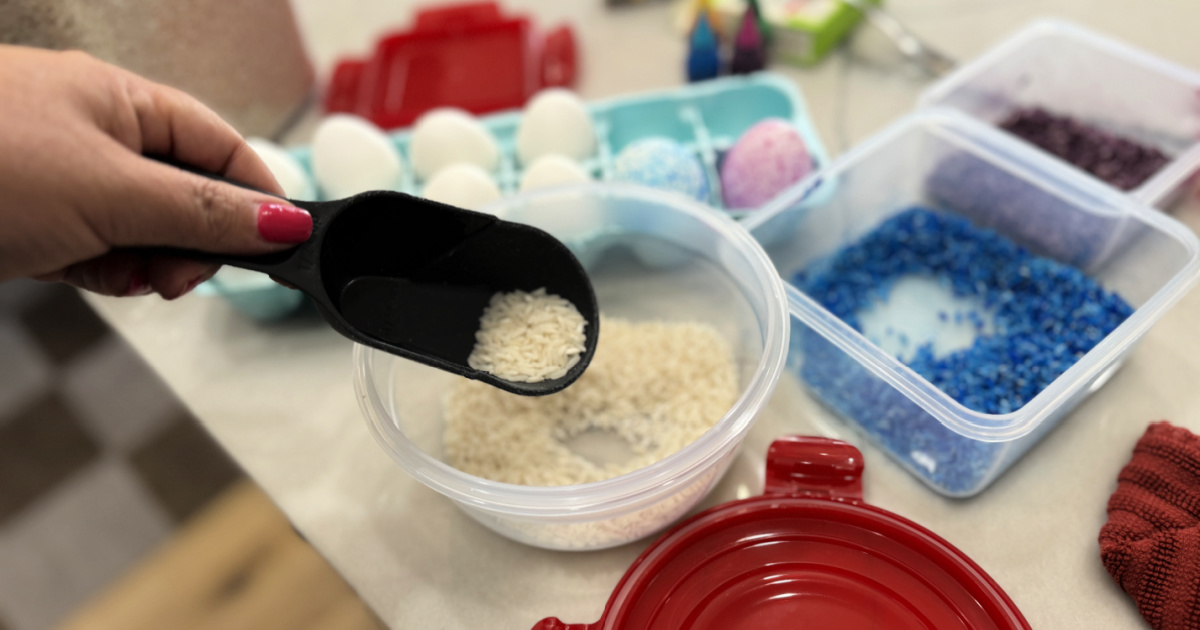 adding rice to a plastic container