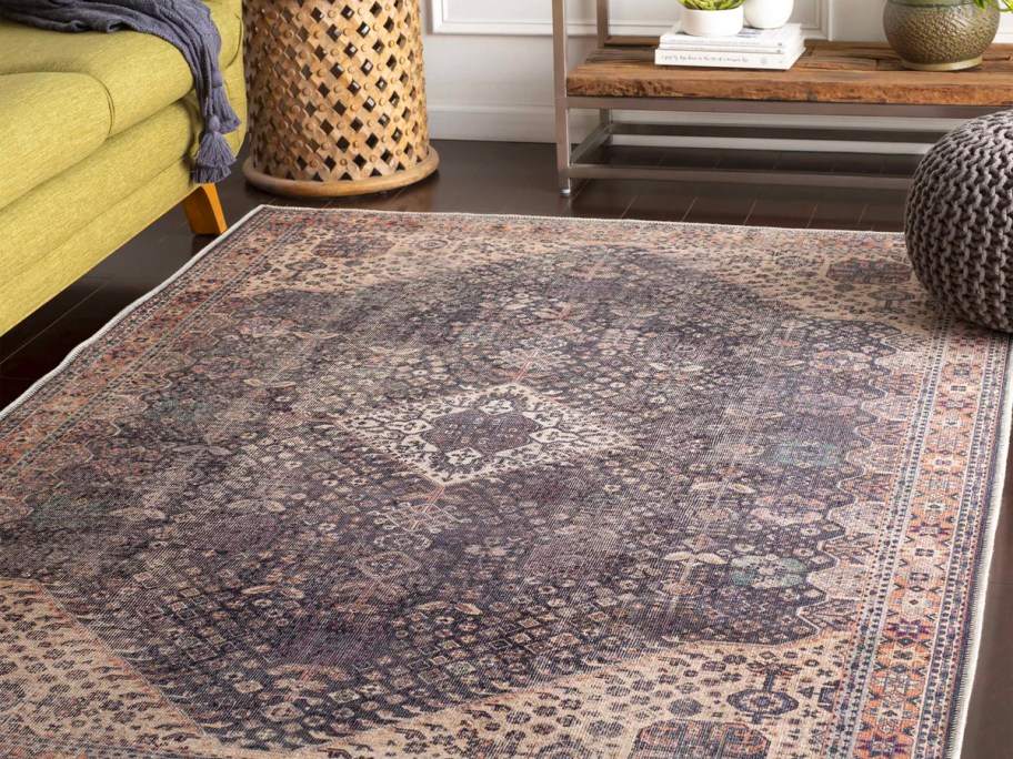 kittrell area rug next to yellow couch