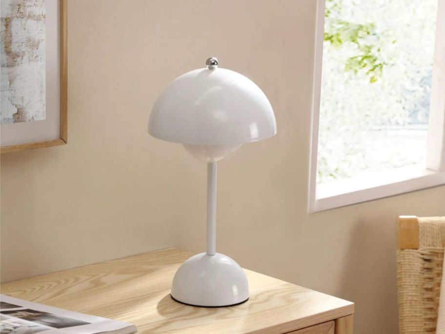 white Mainstays Rechargeable 12" Flowerpot Metal Table Lamp on desk