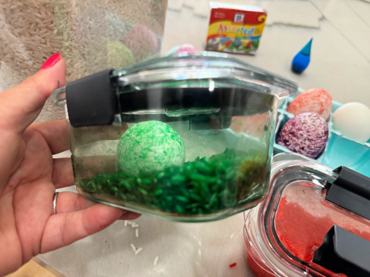 shaking up an egg with dyed rice