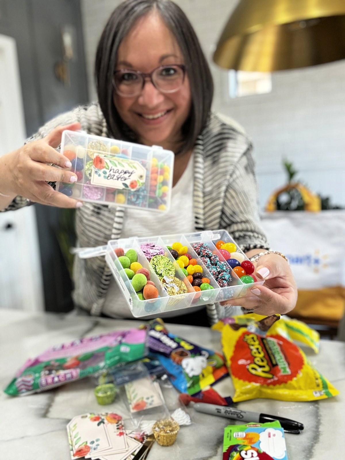woman holding easter snackle boxes