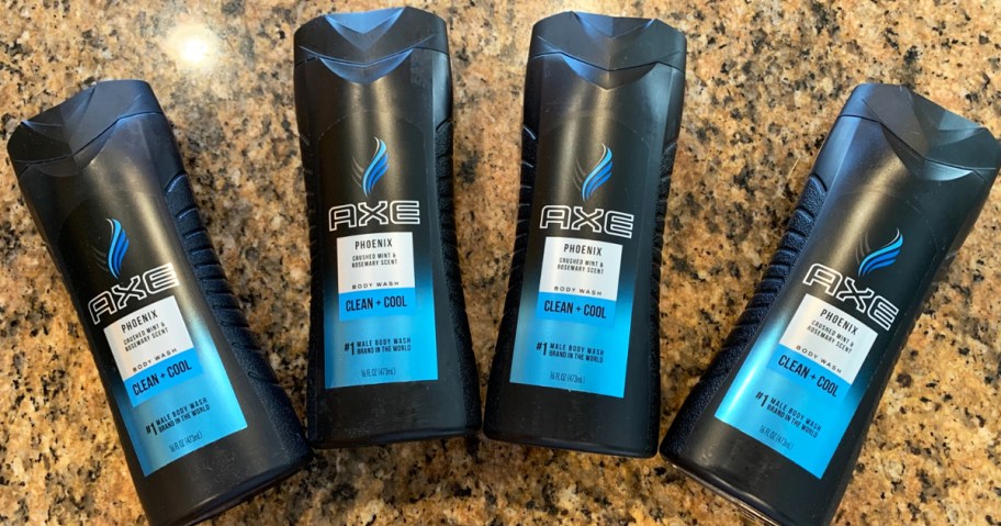 4 bottles of AXE Body Wash on bathroom counter