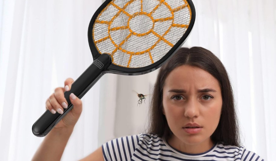 woman holding a Black+Decker Bug Zapper