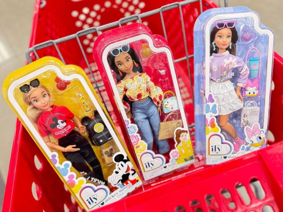 three Disney ILY 4EVER Dolls in cart in store