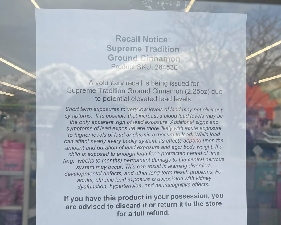 Dollar Tree Cinnamon Recall Notice posted on store door.