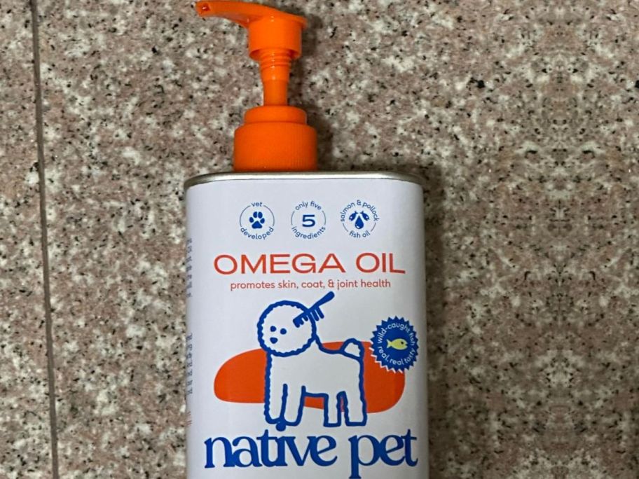 A tin of Native Pet Omega Oil laying on counter