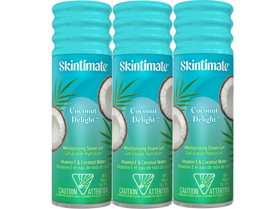 three blue cans of Skintimate Shave Gel