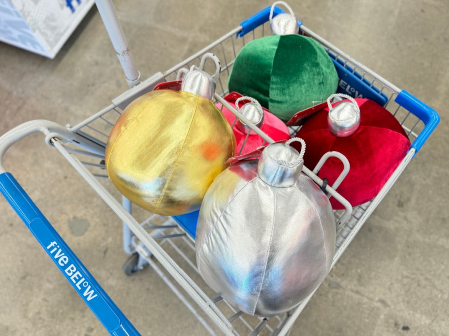 variety of ornament pillows in cart