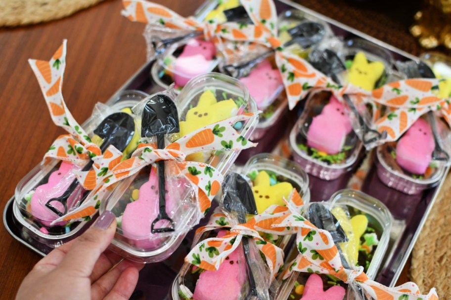 holding a mini loaf pan easter cake