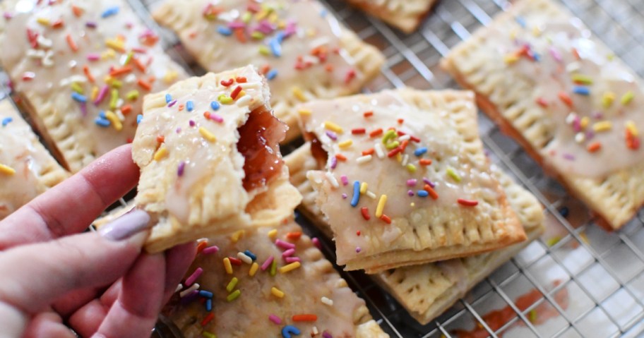 holding a pop-tart cut in half