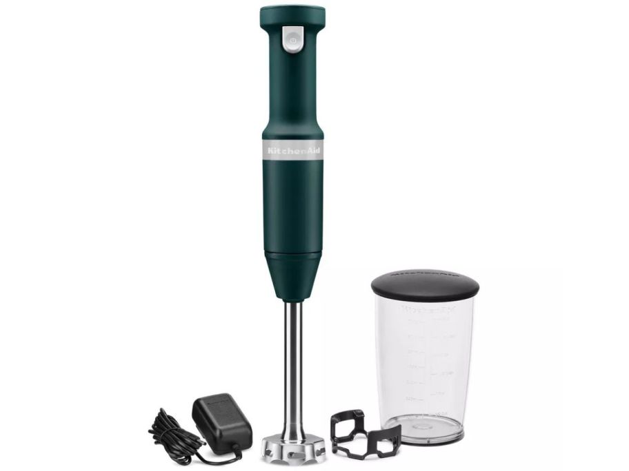 green kitchenaid cordless hand blender stock image with blending jar and charger next to it